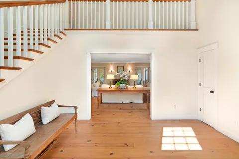a view of a living room and bathroom