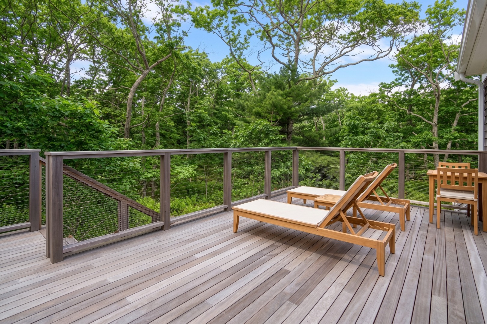 53 Stoney Hill Road West Tisbury, MA 02568 - Photo 45 of 51 a view of house with deck and wooden floor