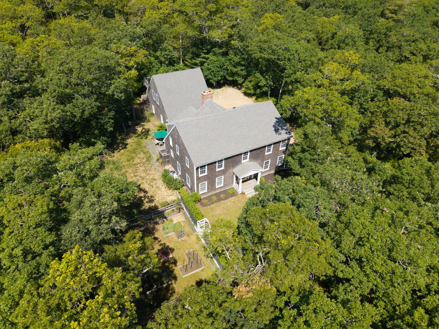53 Stoney Hill Road West Tisbury, MA 02568 - Photo 48 of 51 an aerial view of a house with a yard and swimming pool
