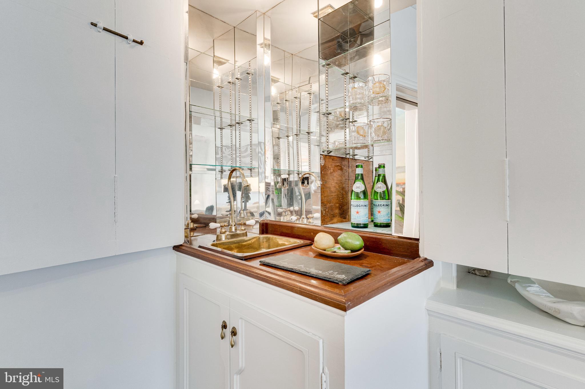 148 F Street Southeast Washington, DC 20003 - Photo 11 of 72 Cleverly-concealed wet bar makes entertaining easy