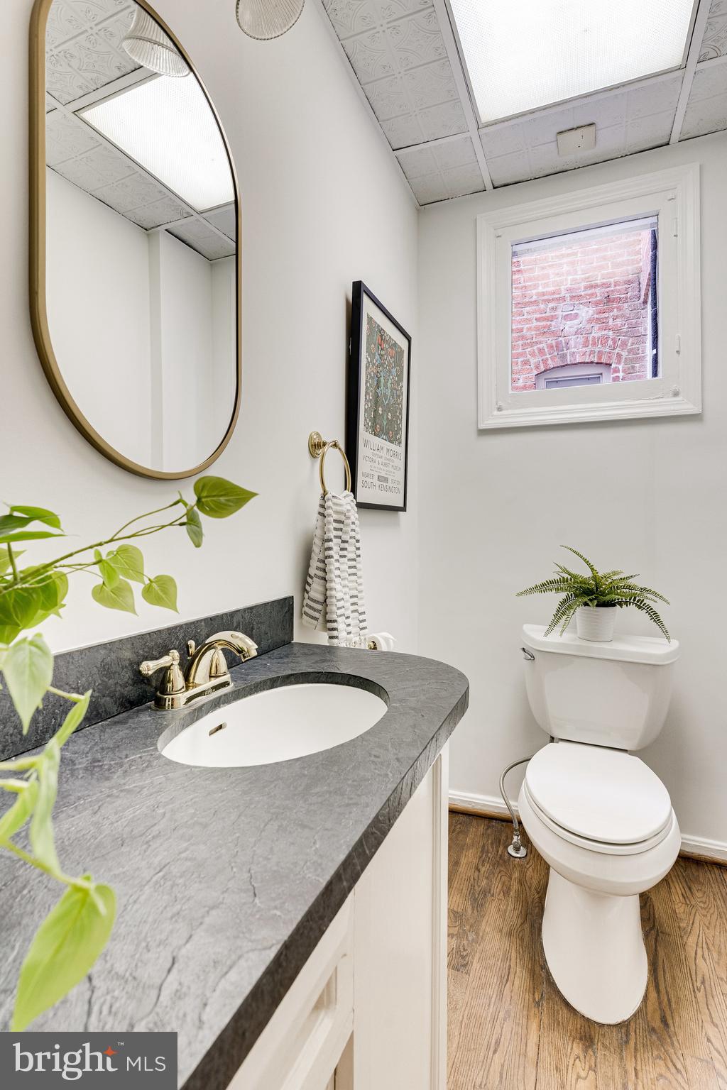 148 F Street Southeast Washington, DC 20003 - Photo 17 of 72 Convenient half bath on main level