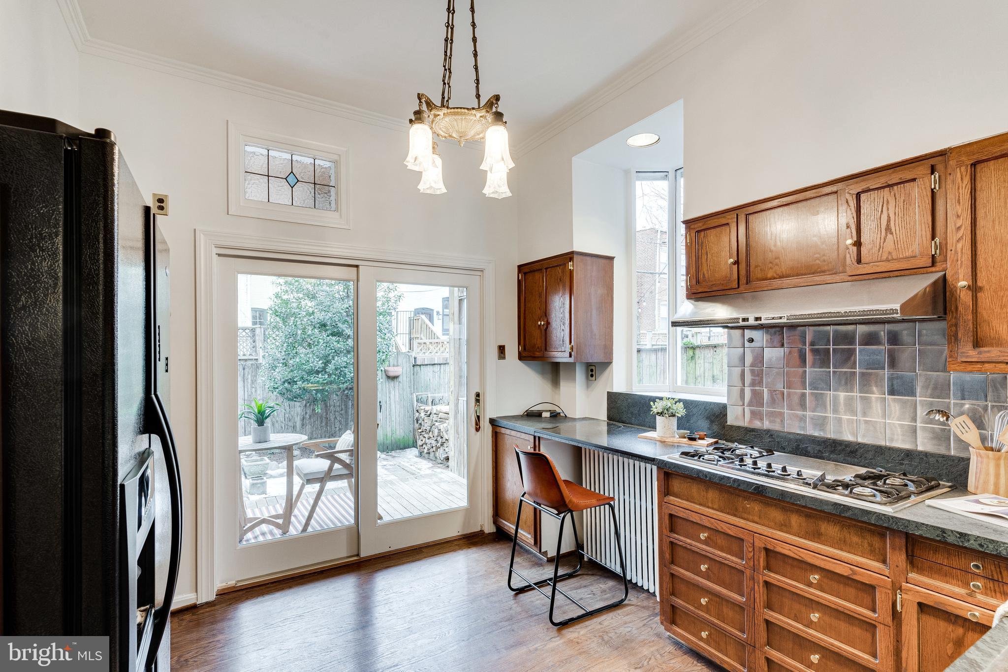 148 F Street Southeast Washington, DC 20003 - Photo 18 of 72 Spacious bright kitchen opens to deck and patio