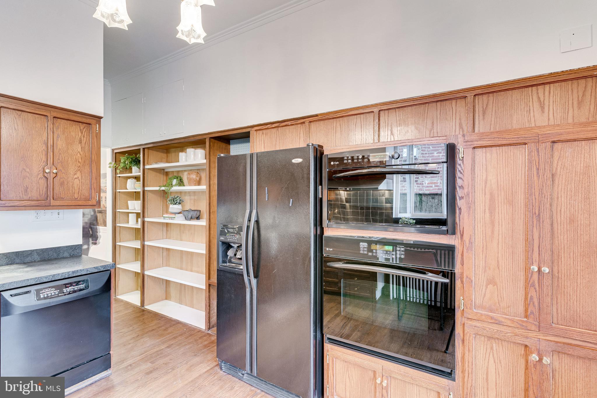 148 F Street Southeast Washington, DC 20003 - Photo 22 of 72 Pantry, double wall ovens and open shelving