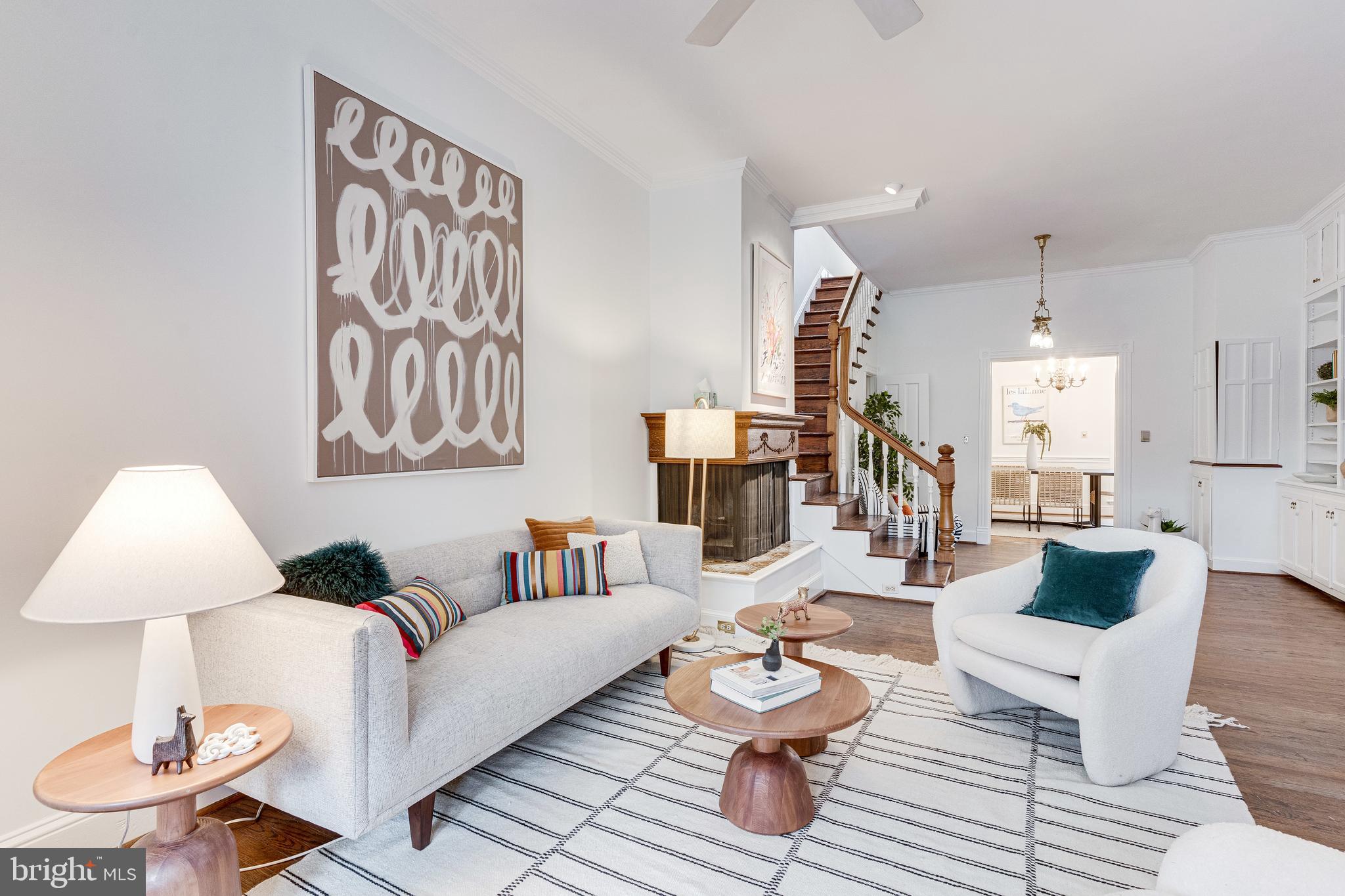 148 F Street Southeast Washington, DC 20003 - Photo 4 of 72 Open yet intimate LR has fireplace, tall ceilings