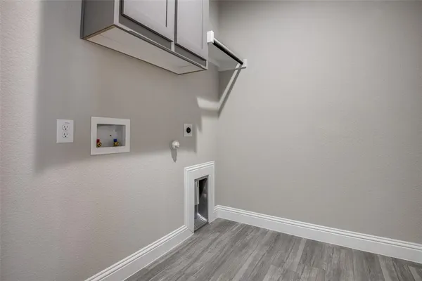 a view of small space with wooden floor