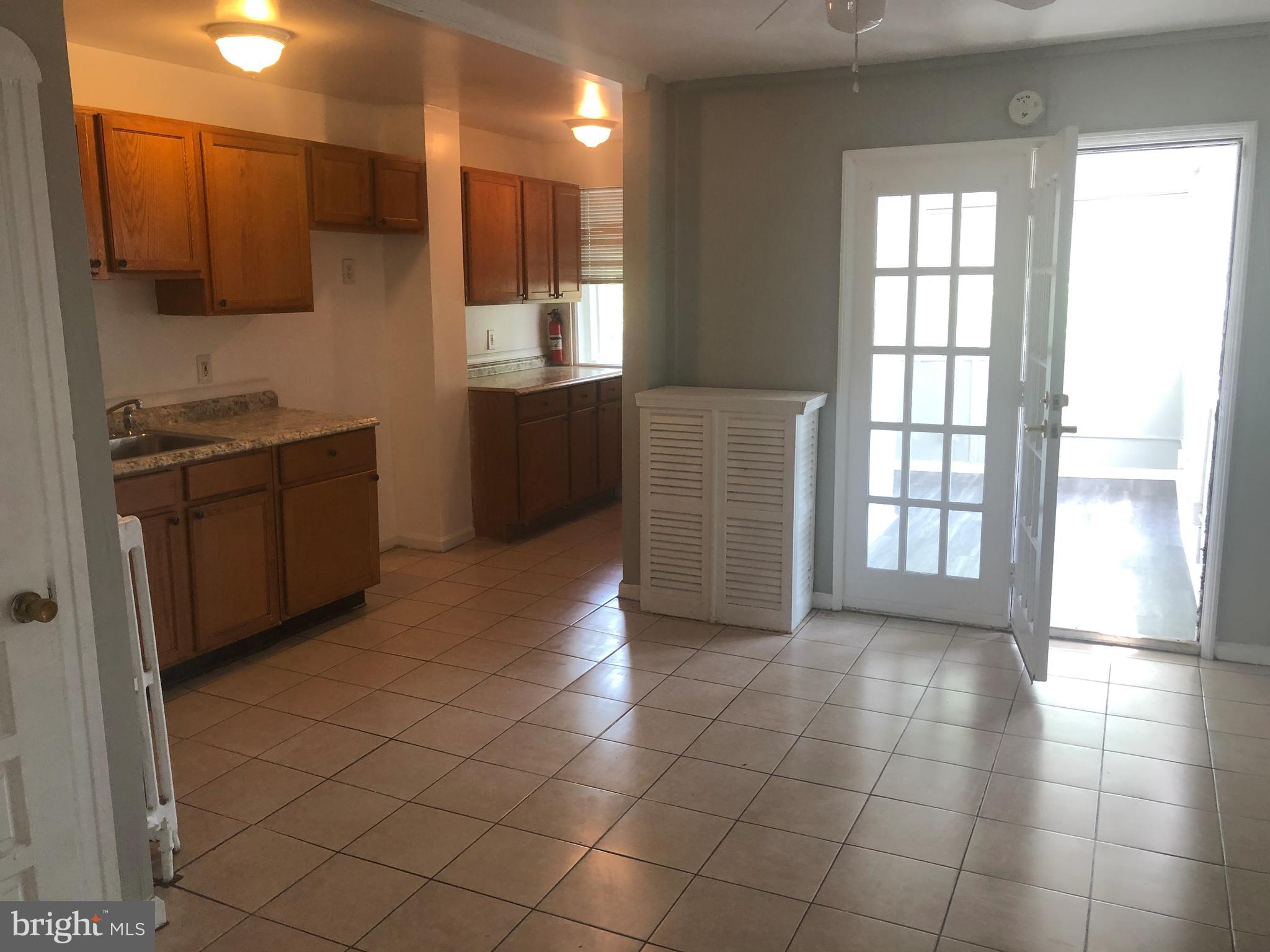 214 Guilford Road Lansdowne, PA 19050 - Photo 10 of 24 Dining room and Kitchen