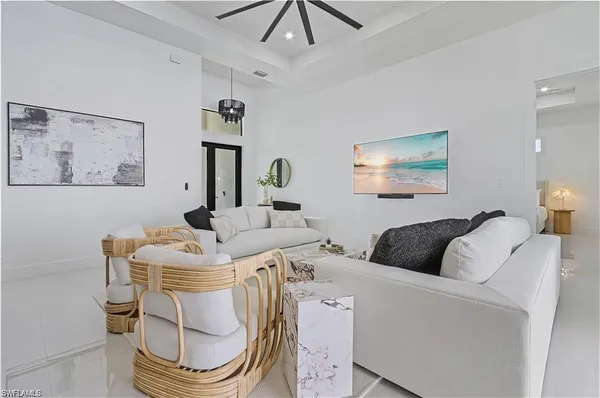 a living room with furniture and a table