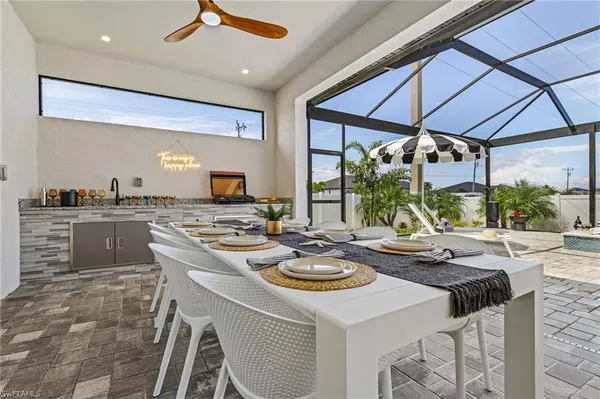 a dining room with furniture and window