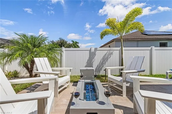 a black and white checkered floor with a rug