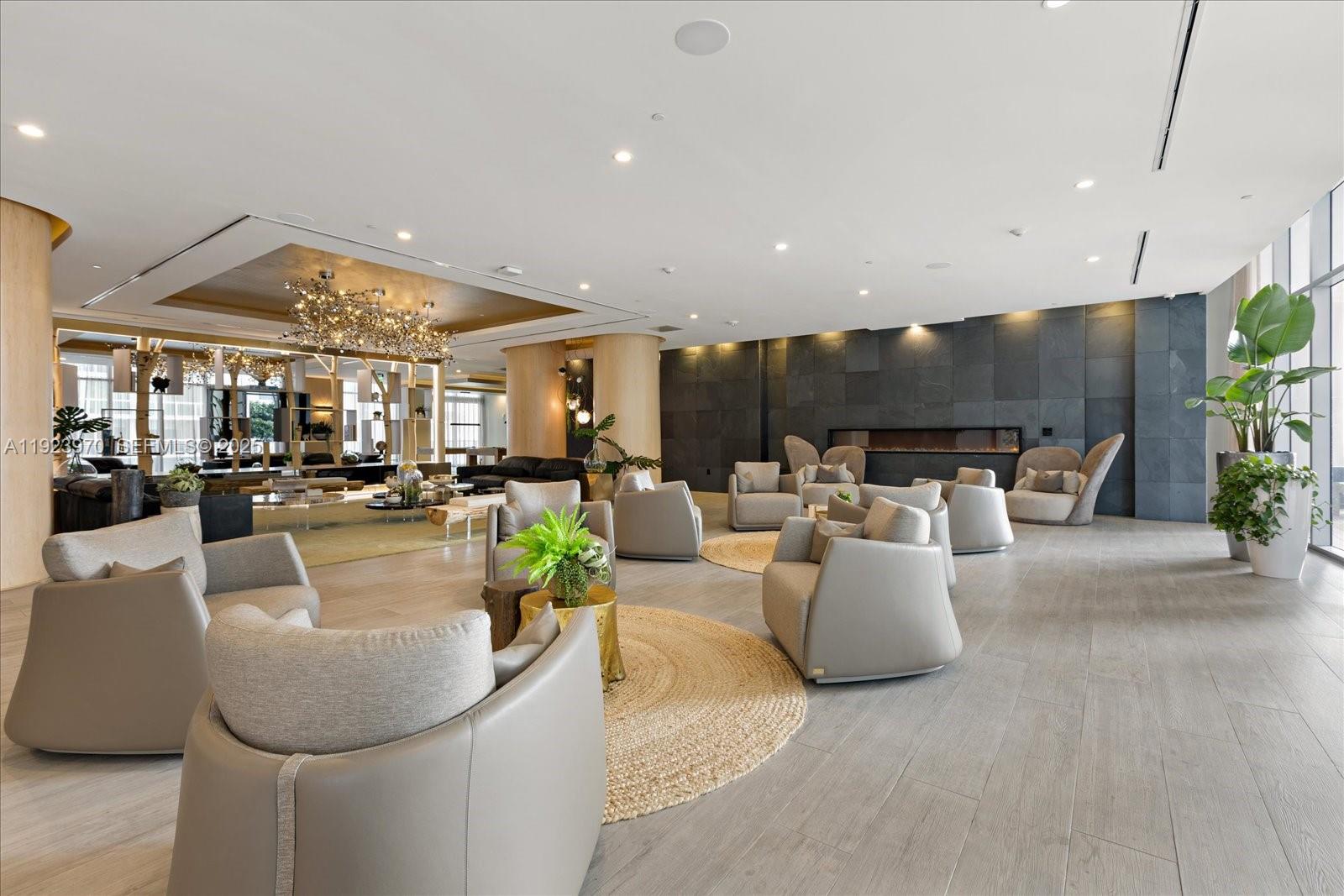 488 Northeast 18th Street, Unit 4102 Miami, FL 33132 - Photo 27 of 60 a living room with furniture and a large window