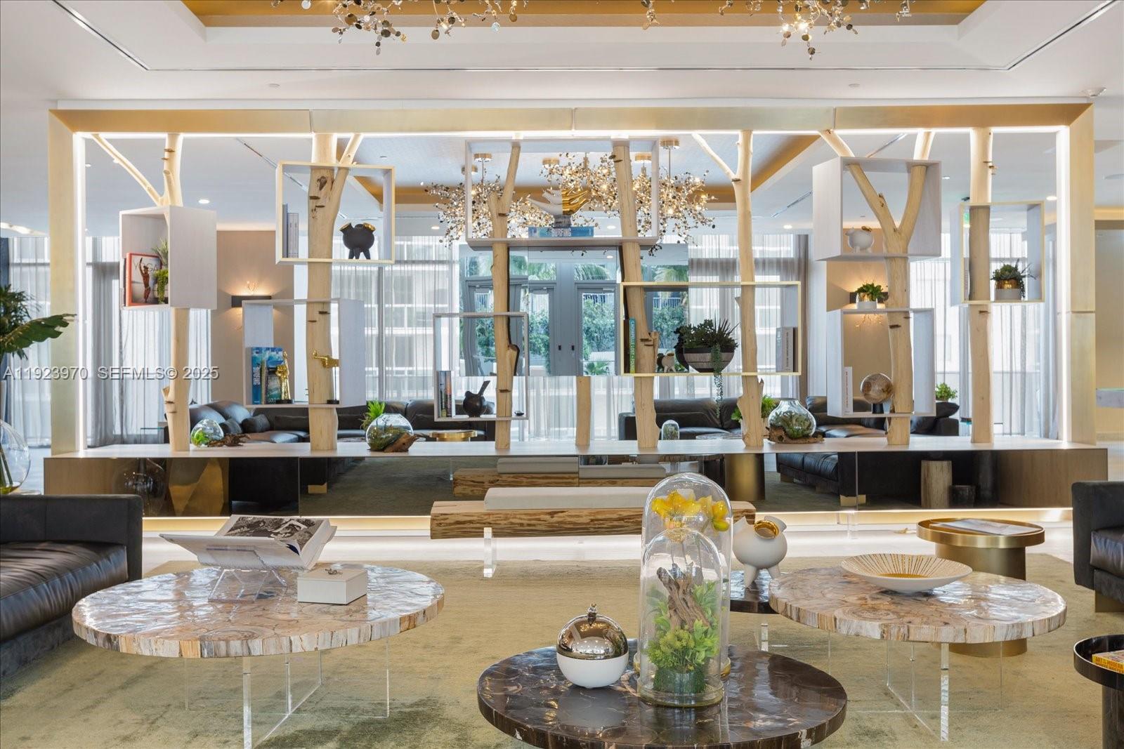 488 Northeast 18th Street, Unit 4102 Miami, FL 33132 - Photo 29 of 60 a living room with furniture and a large window