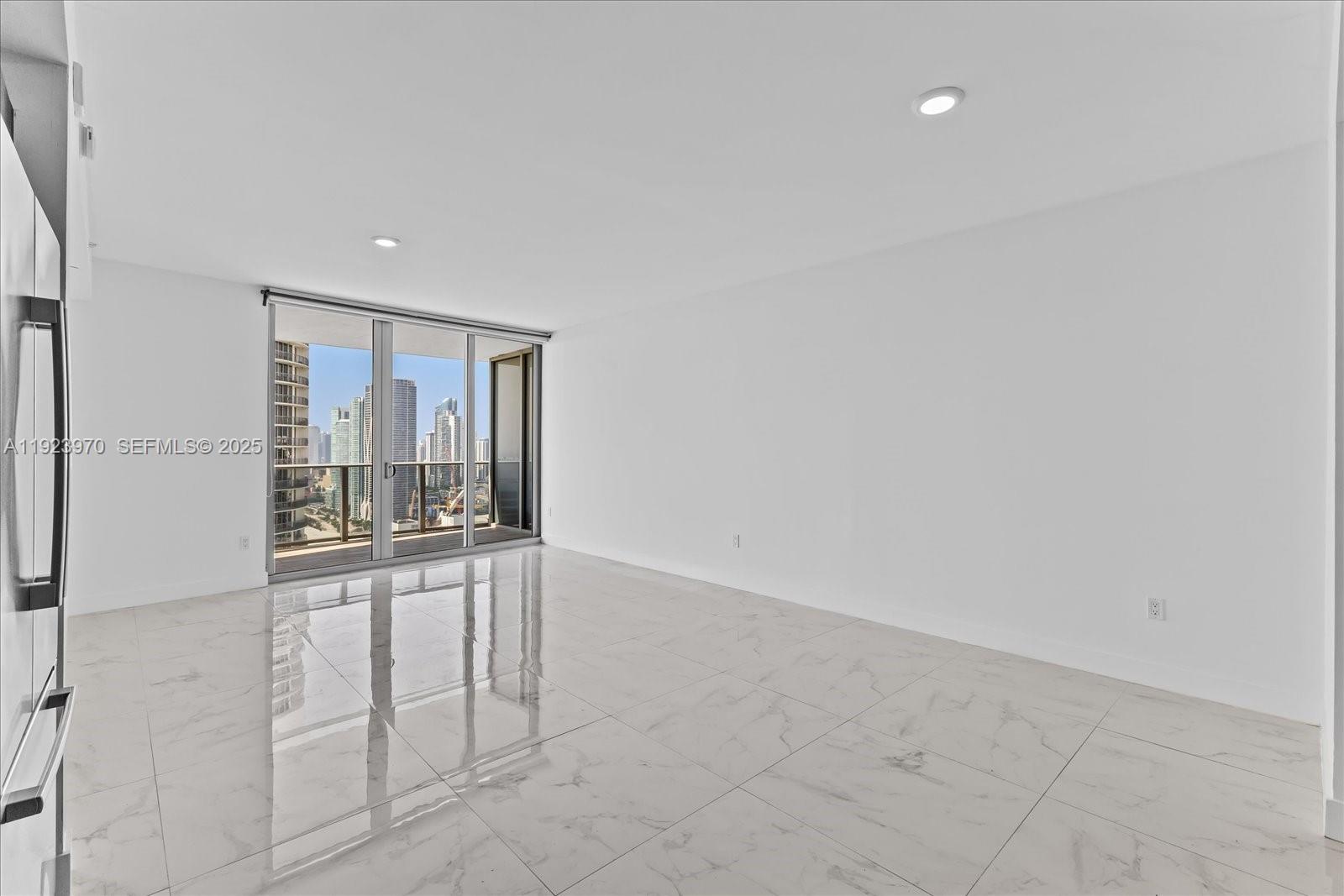 488 Northeast 18th Street, Unit 4102 Miami, FL 33132 - Photo 6 of 60 wooden floor in an empty room