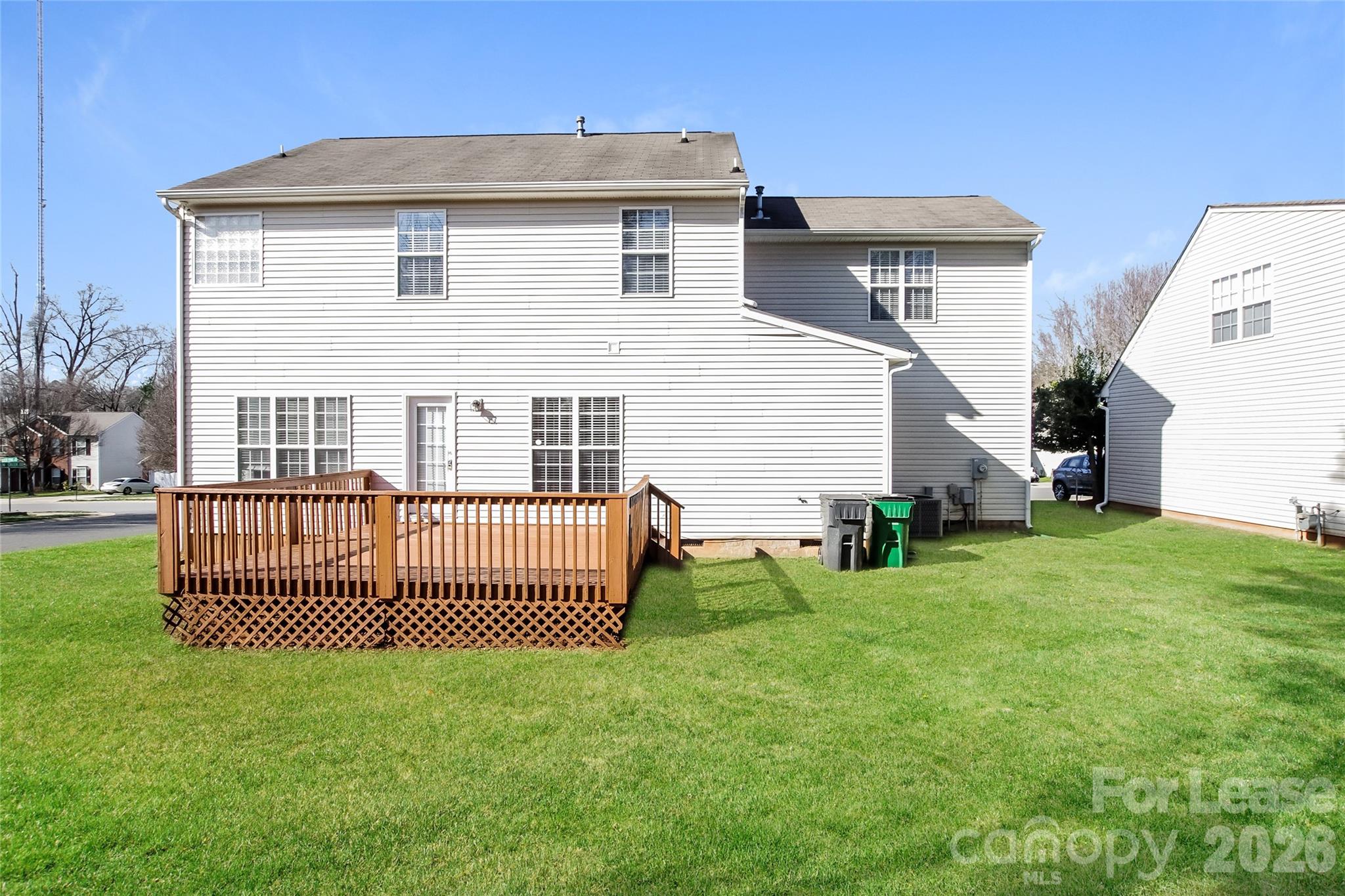 10802 Gold Pan Road Charlotte, NC 28215 - Photo 15 of 15 a view of a house with a yard