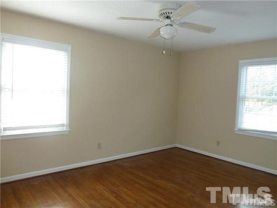 2016 Quail Ridge Road Raleigh, NC 27609 - Photo 2 of 3 an empty room with a window
