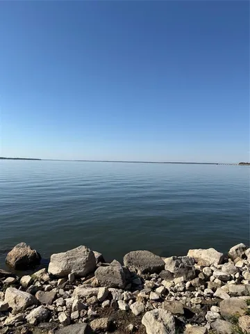 a view of lake with mountain