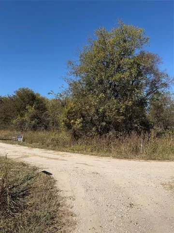 a view of a yard covered with snow