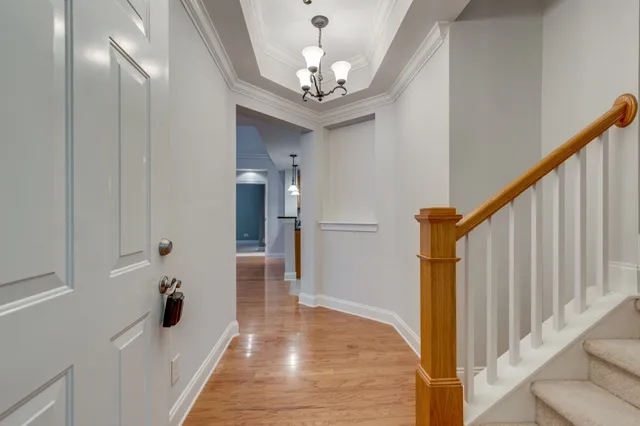 a view of a hallway view with staircase
