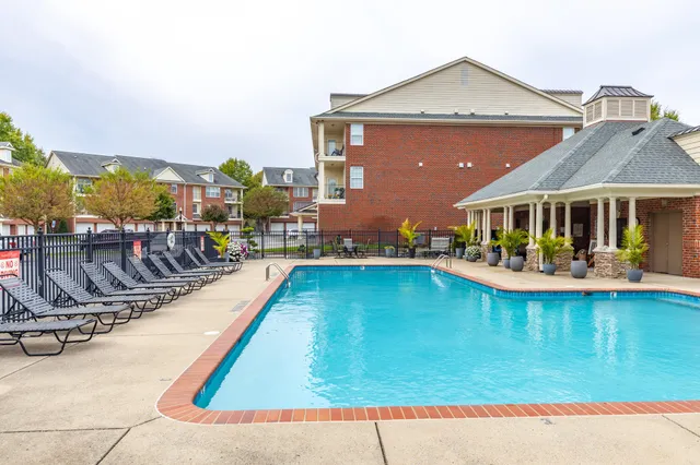 a view of a house with swimming pool