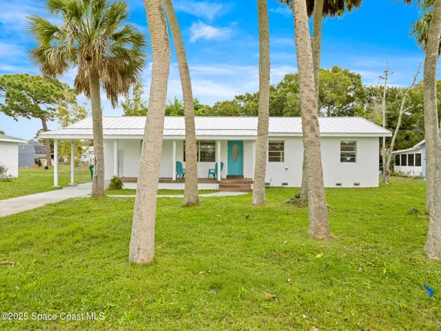 a house view with a garden space