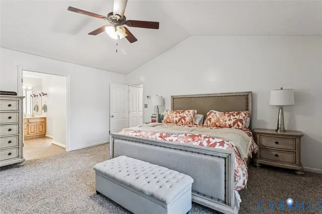 a spacious bathroom with a granite countertop sink and a mirror