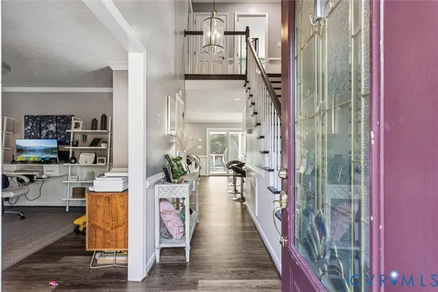 a view of a living room and dining room