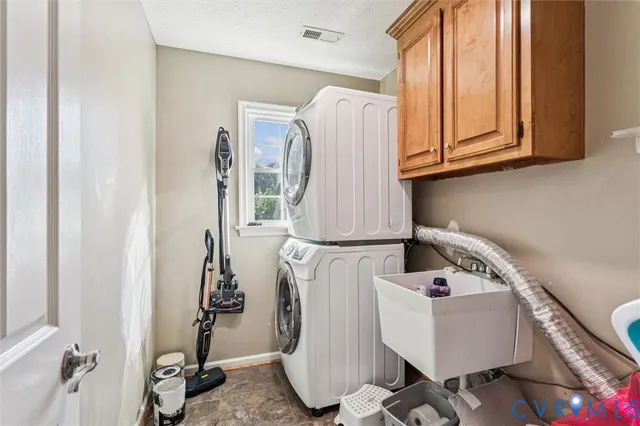 a white toilet sitting next to a bathroom sink and shower