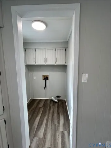 a view of a livingroom with wooden floor