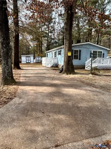 a view of street along with trees