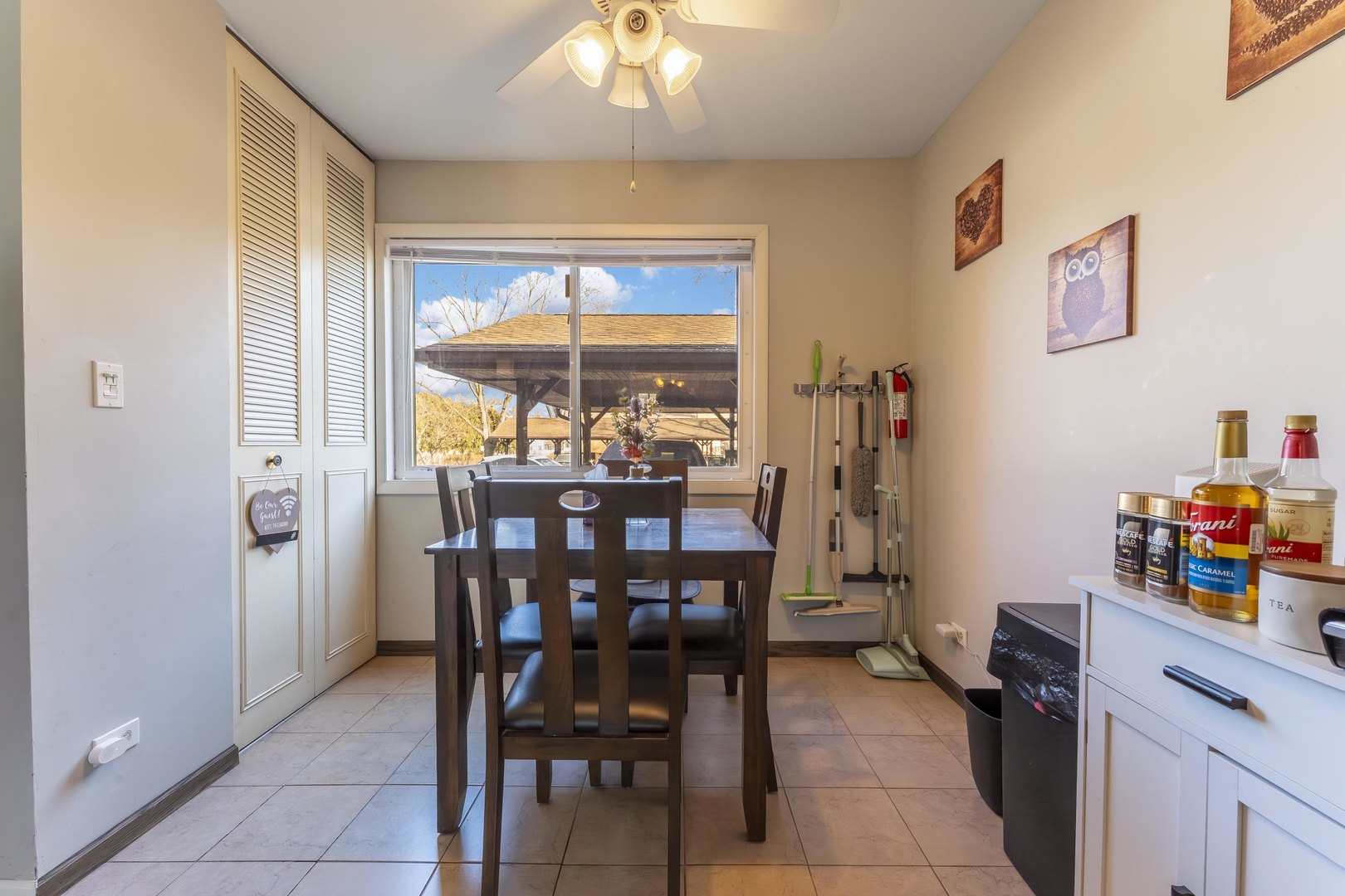 404 Arrow Trail Wheeling, IL 60090 - Photo 8 of 26 a view of a dining room with furniture window and outside view