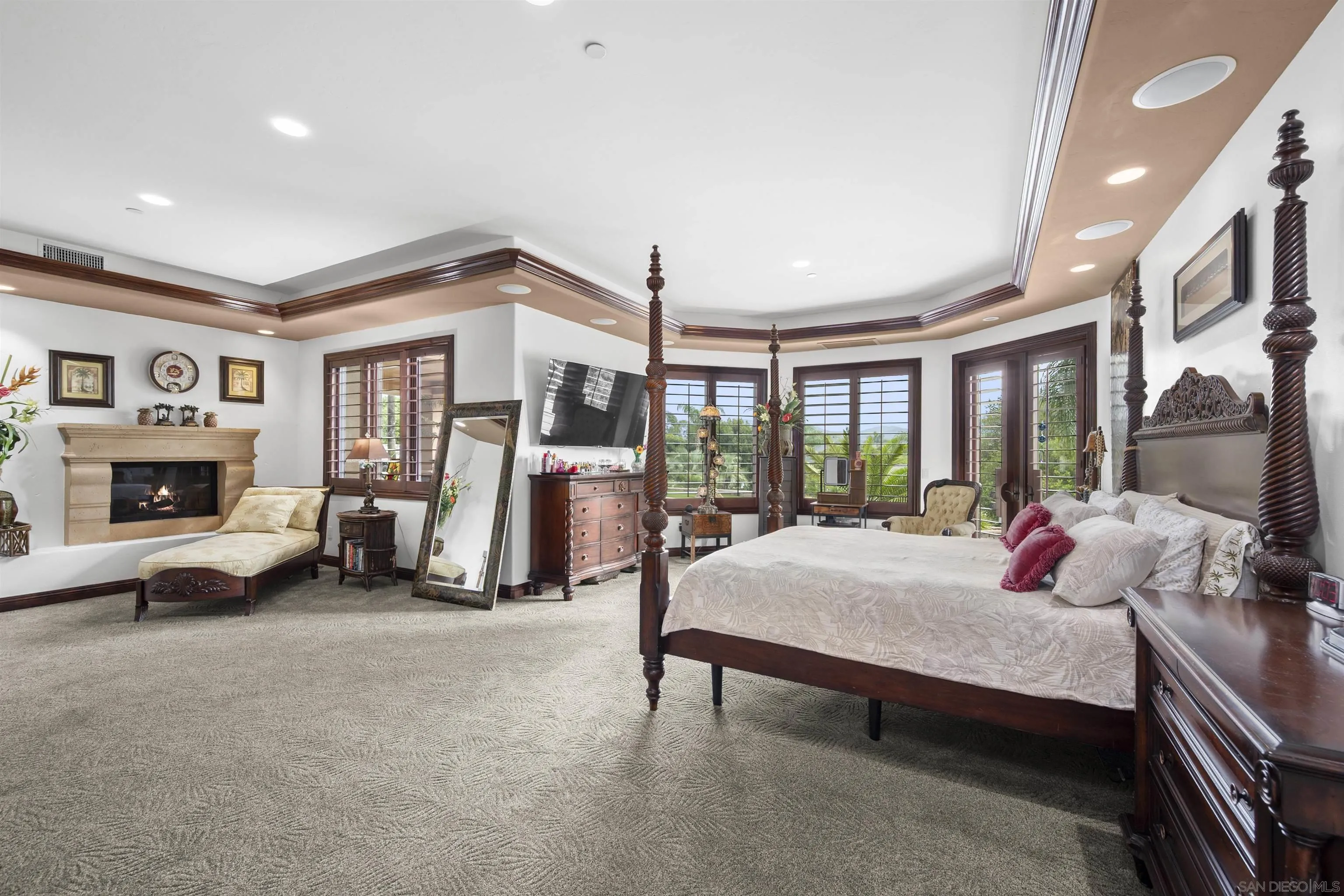 2882 Conestoga Circle Alpine, CA 91901 - Photo 36 of 75 a bedroom with furniture and a fireplace