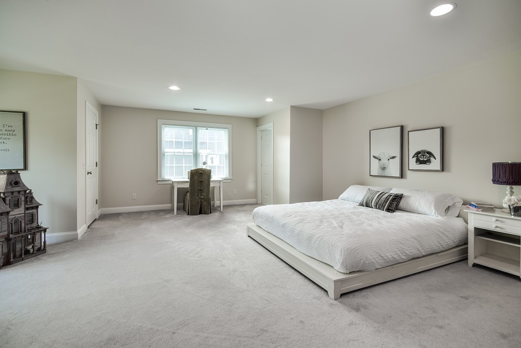 11 Marshall Road Wellesley, MA 02482 - Photo 11 of 18 a spacious bedroom with a bed and window