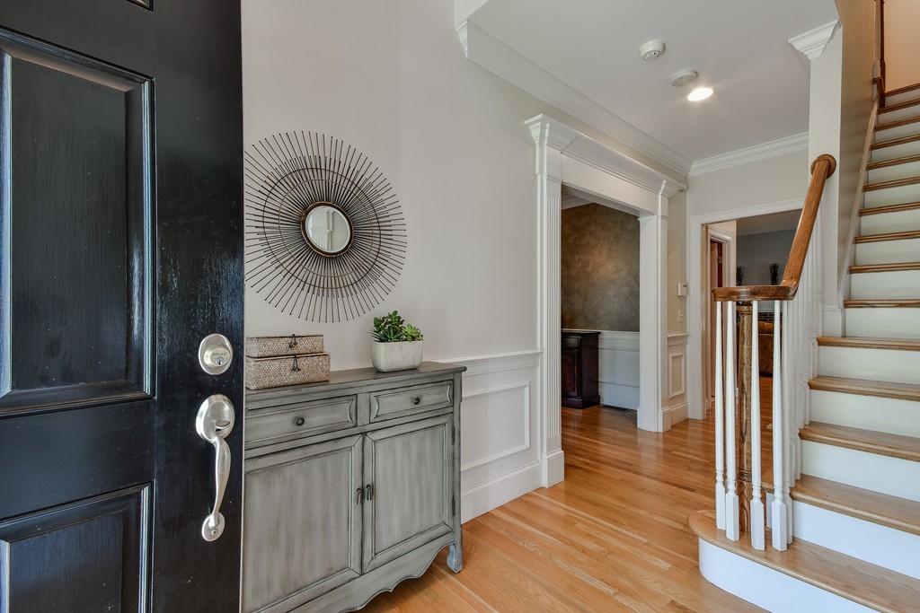 11 Marshall Road Wellesley, MA 02482 - Photo 2 of 18 a kitchen with a refrigerator and a stove top oven