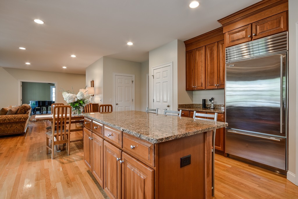 11 Marshall Road Wellesley, MA 02482 - Photo 7 of 18 a kitchen with a sink stove and cabinets