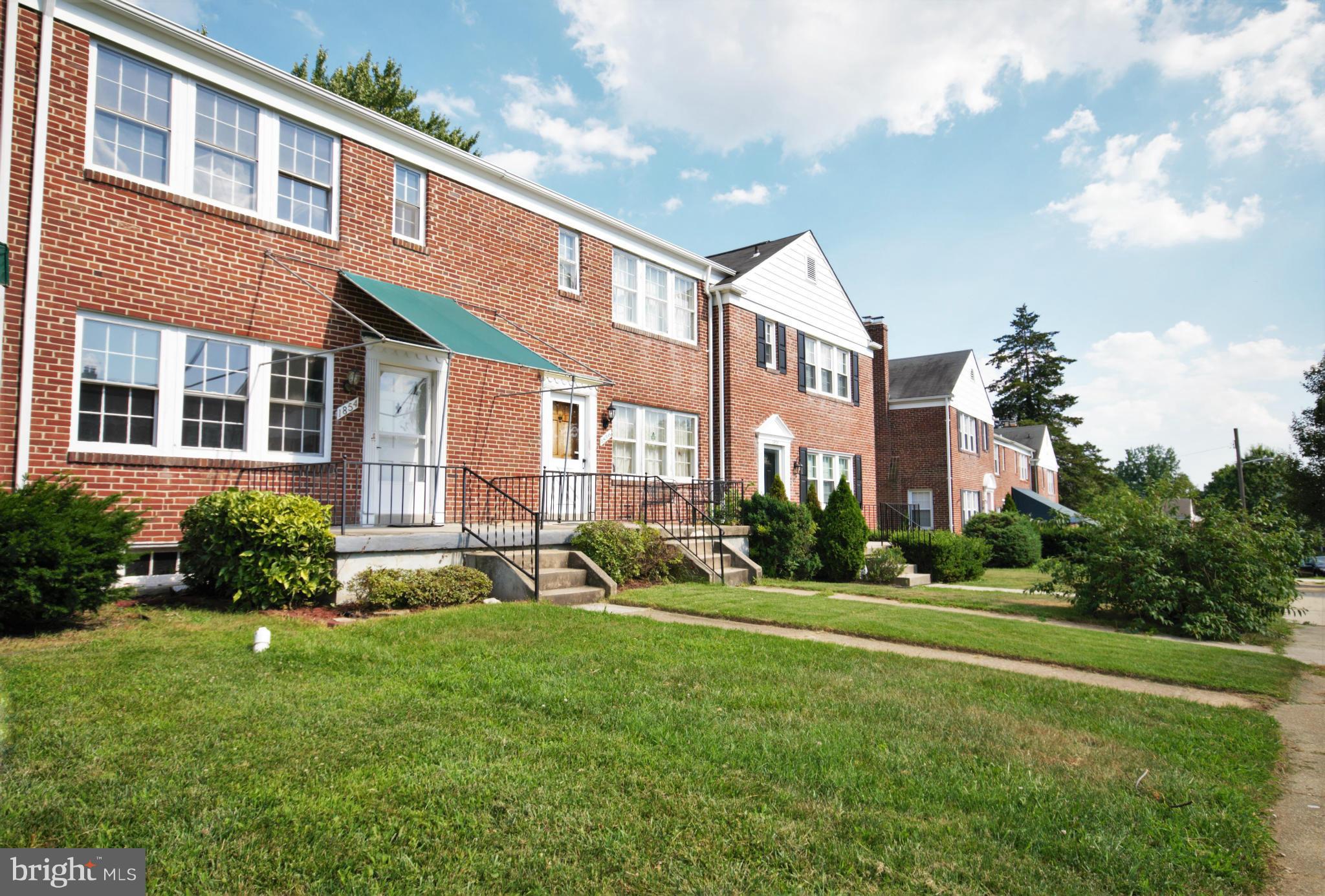 1854 Loch Shiel Road Baltimore, MD 21286 - Photo 1 of 23 a view of a building with a yard