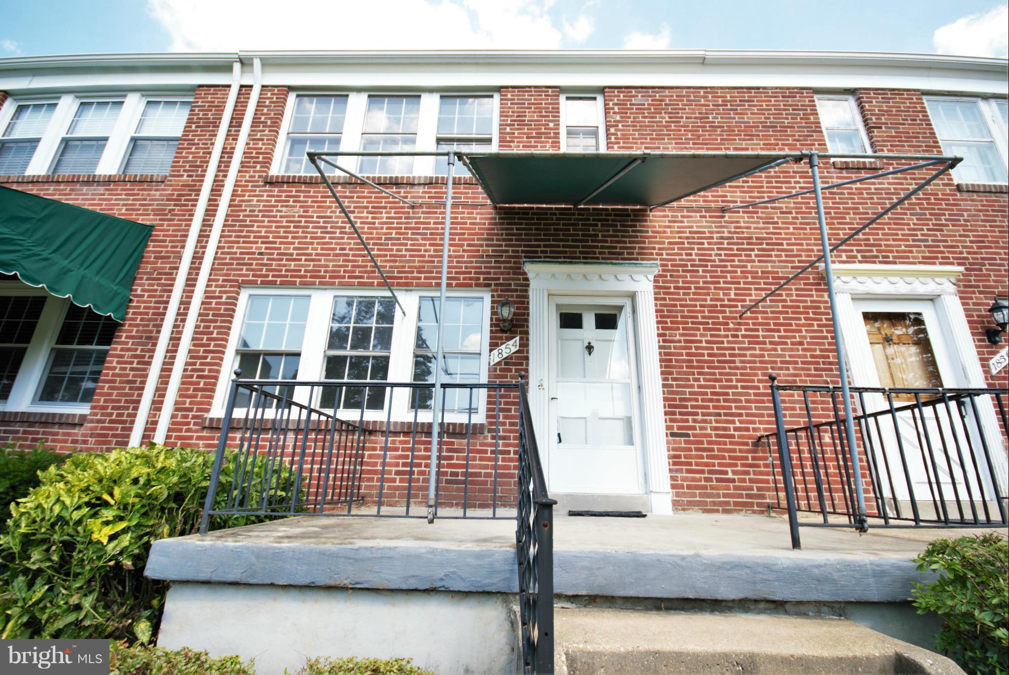 1854 Loch Shiel Road Baltimore, MD 21286 - Photo 3 of 23 a front view of a house with a porch