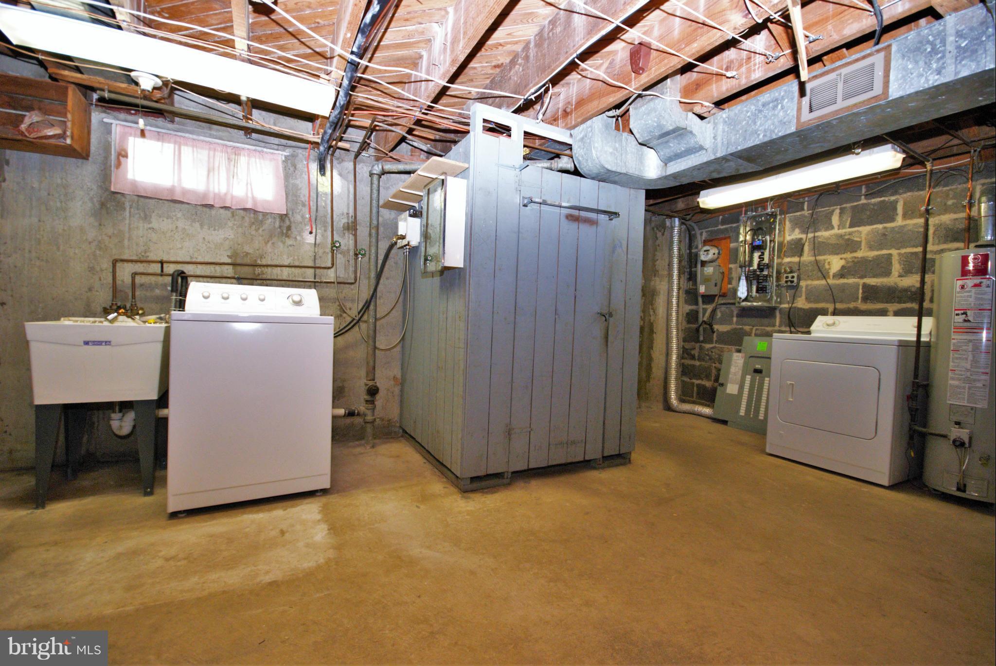 1854 Loch Shiel Road Baltimore, MD 21286 - Photo 22 of 23 a view of a storage & utility room with washer and dryer