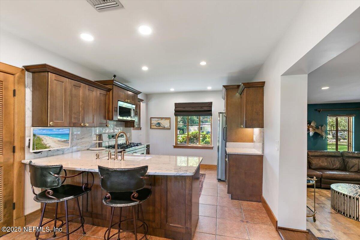 701 Old Hickory Road Jacksonville, FL 32207 - Photo 11 of 36 a view of a dining room with furniture