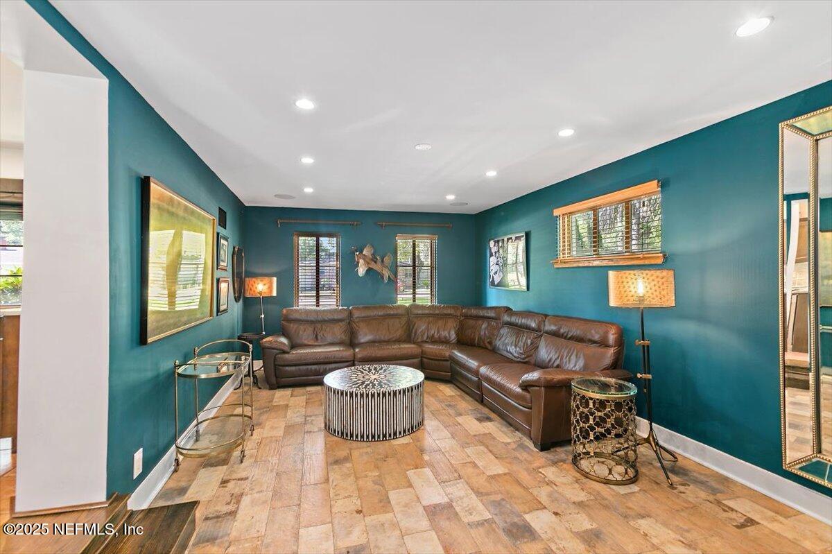 701 Old Hickory Road Jacksonville, FL 32207 - Photo 17 of 36 a living room with furniture and a potted plant