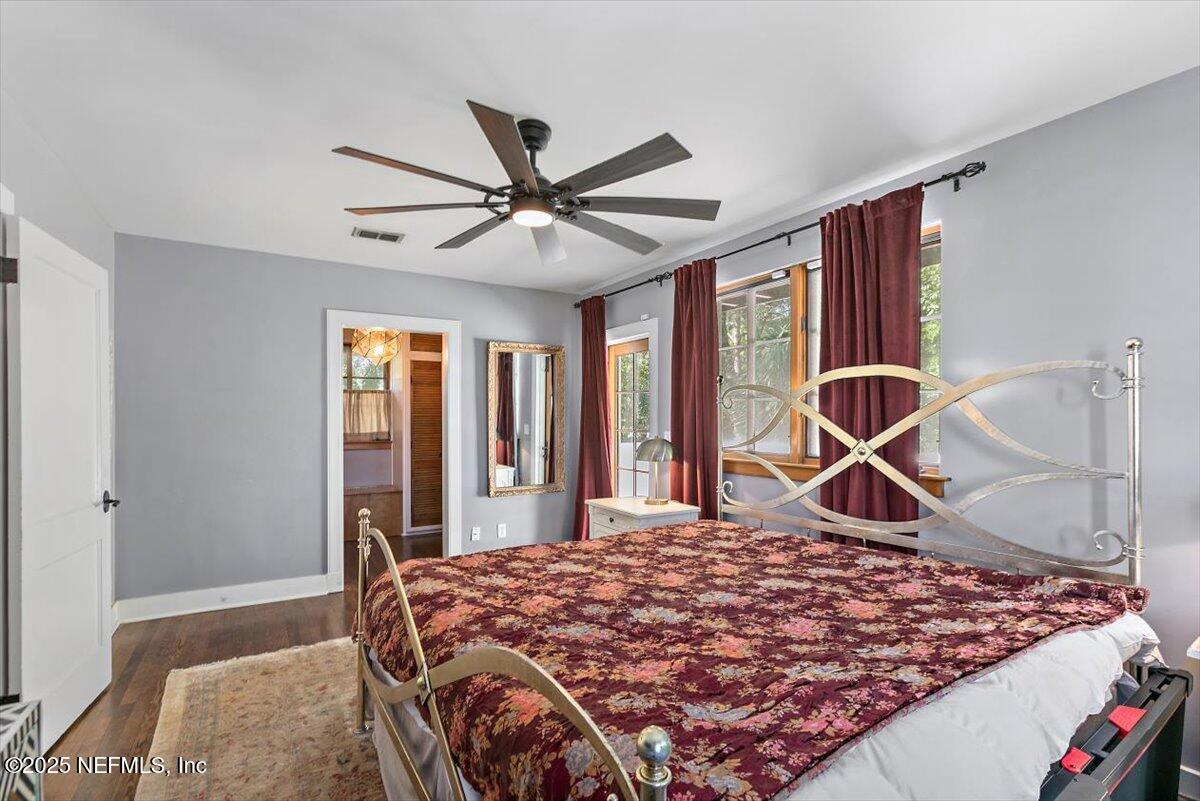 701 Old Hickory Road Jacksonville, FL 32207 - Photo 21 of 36 a bedroom with a bed and a dresser