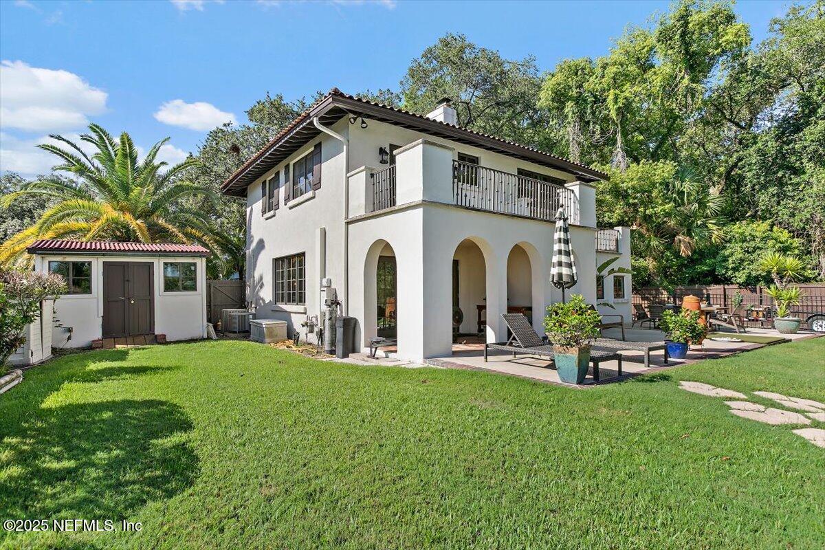 701 Old Hickory Road Jacksonville, FL 32207 - Photo 29 of 36 a view of a house with backyard porch and sitting area