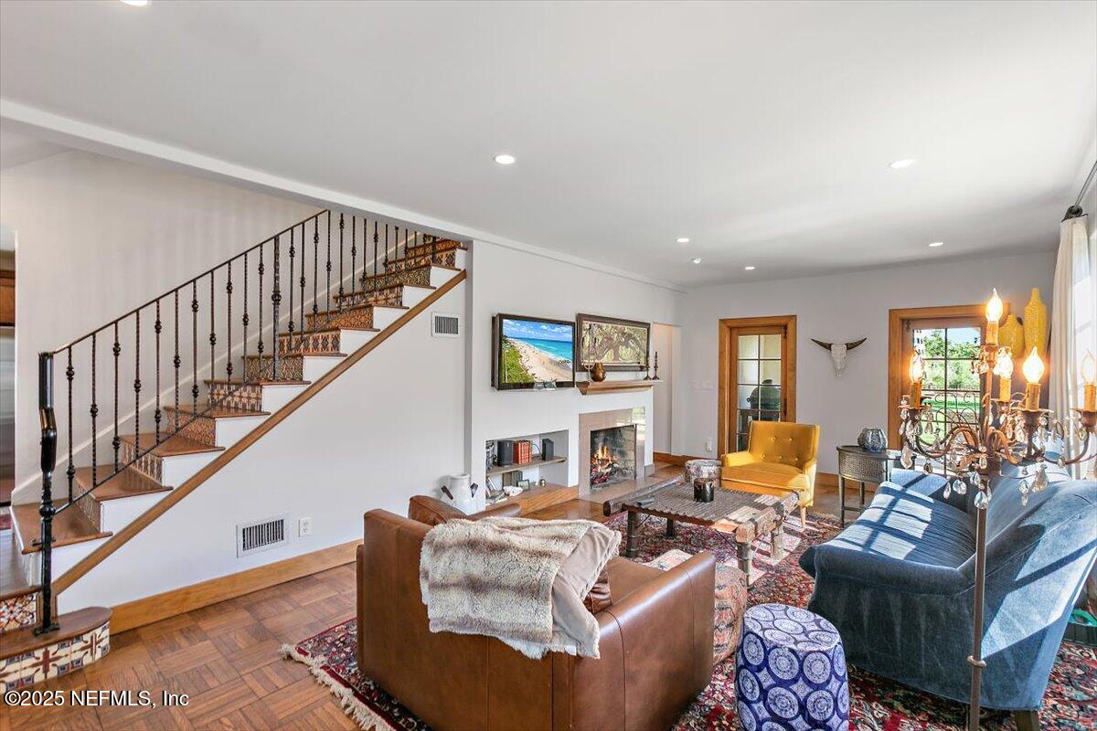 701 Old Hickory Road Jacksonville, FL 32207 - Photo 8 of 36 a living room with fireplace furniture and a wooden floor