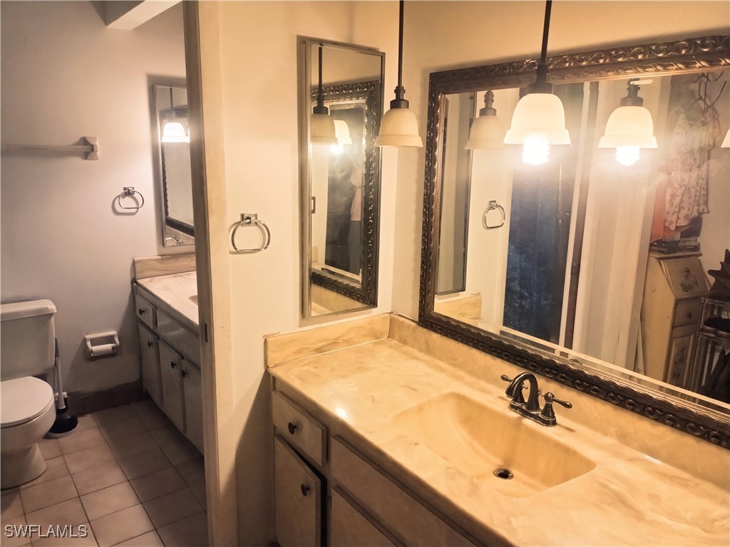 17091 Charlee Road Punta Gorda, FL 33955 - Photo 11 of 44 a bathroom with a sink a toilet and shower