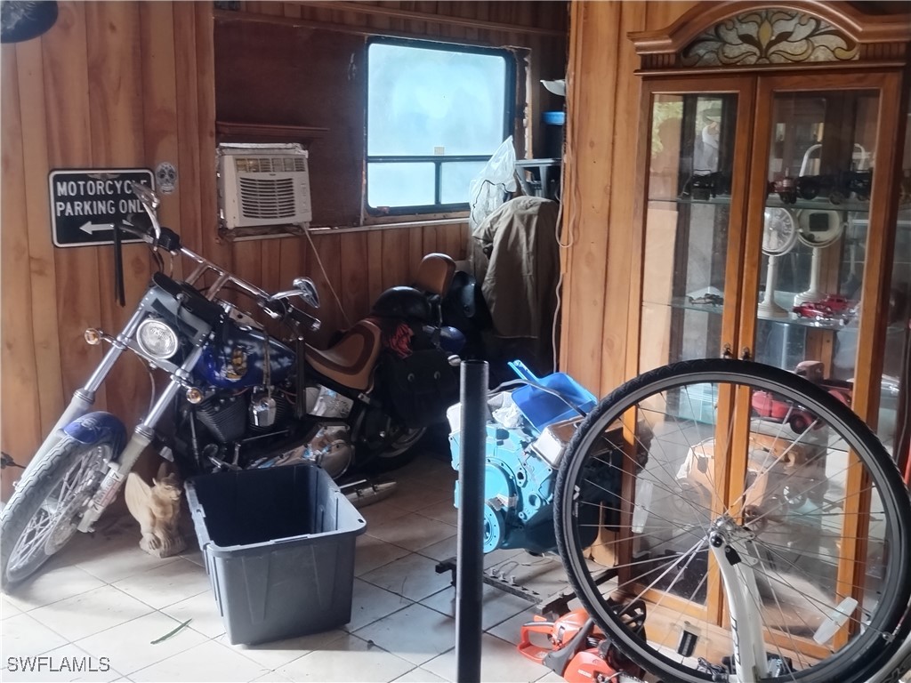 17091 Charlee Road Punta Gorda, FL 33955 - Photo 42 of 44 a view of a balcony with furniture and front door