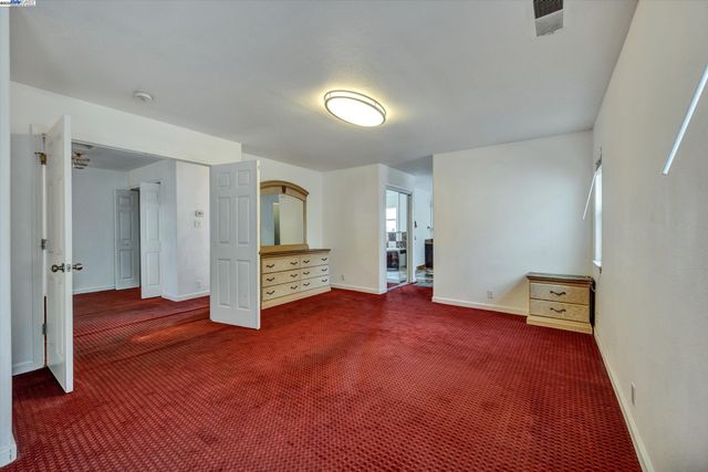 wooden floor and an empty room with wooden floor and closet