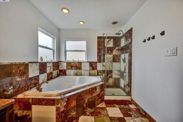 a bathroom with a sink and a bathtub