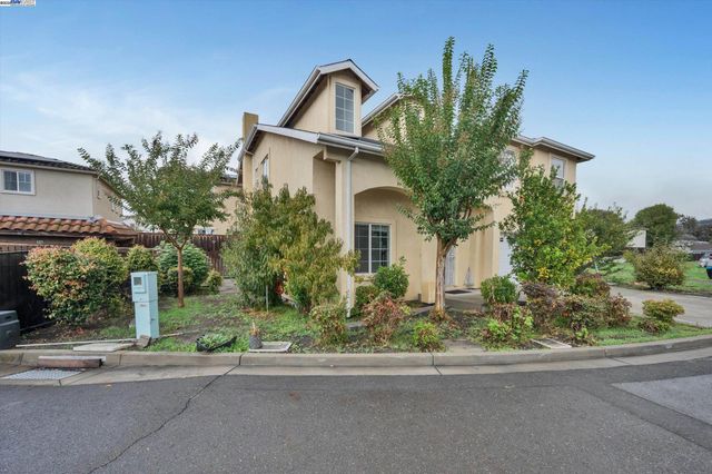 front view of a house with a street