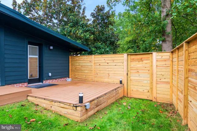 a view of backyard with cabin