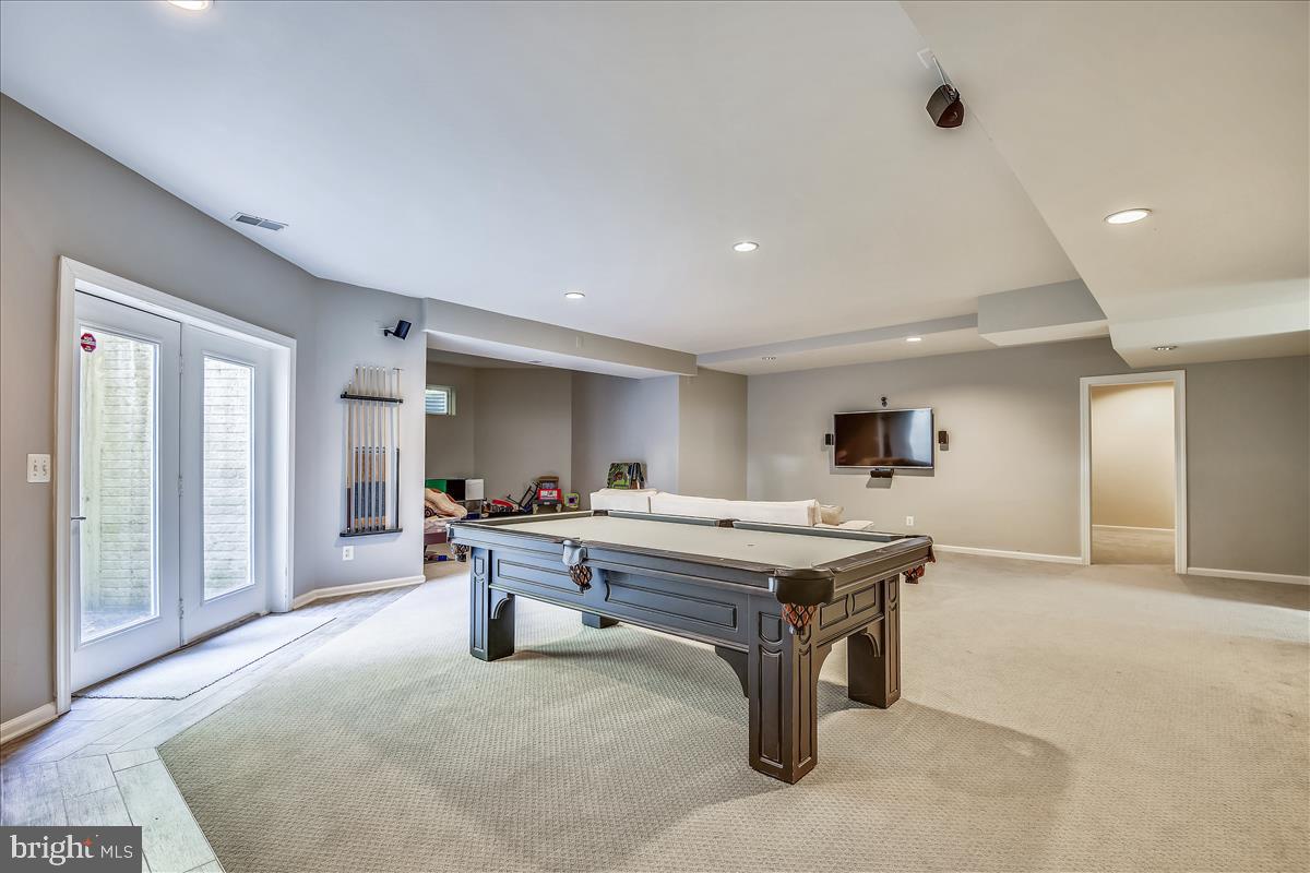 92 Colony Crossing Edgewater, MD 21037 - Photo 29 of 48 Lower Level Game Room with exit to yard