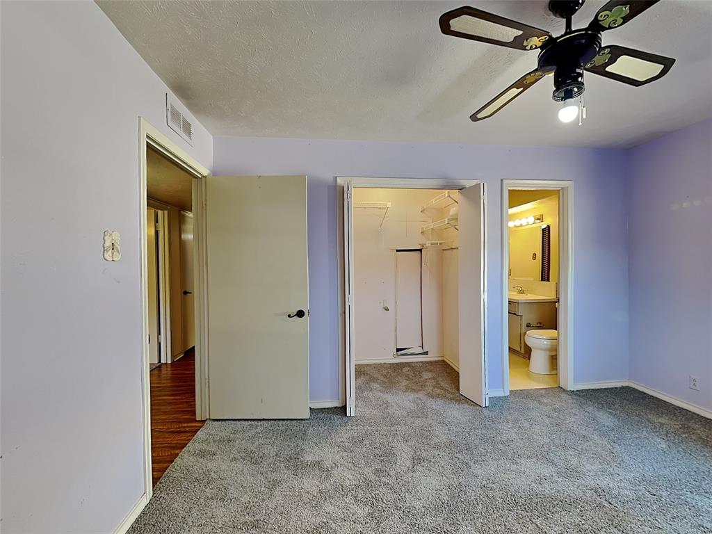 13630 Willow Bend Road Dallas, TX 75240 - Photo 9 of 17 wooden floor in a hall with a window