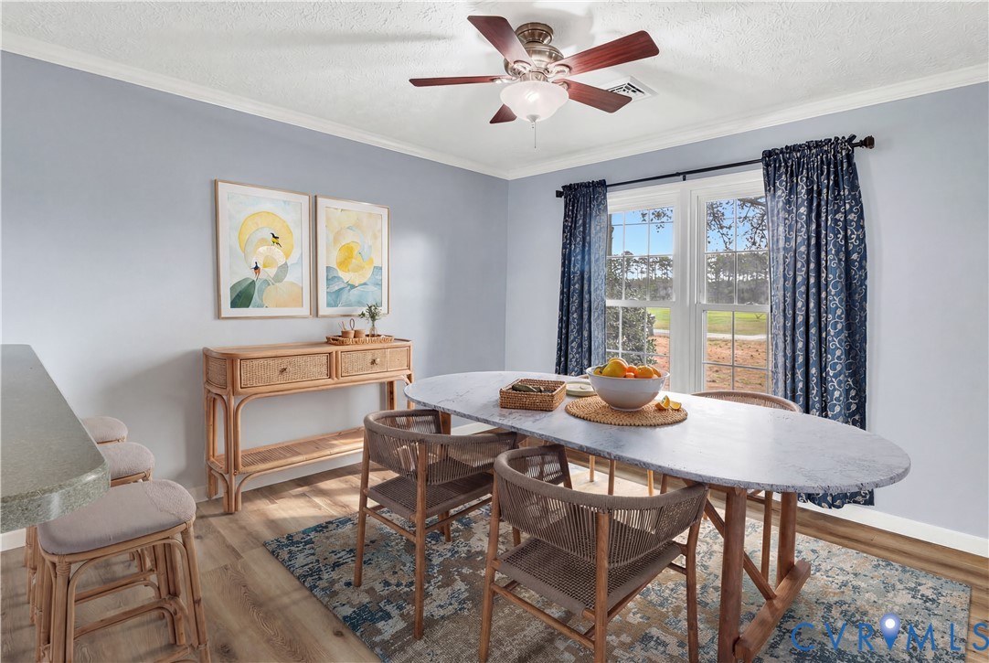 9829 Line Fence Road Hayes, VA 23072 - Photo 12 of 64 a view of a dining room with furniture window and outside view